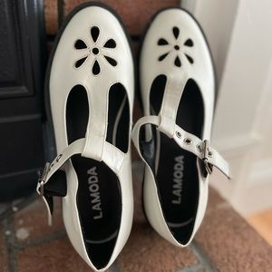 Platform Mary Janes.   Never worn. Size 6